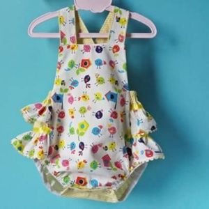 12 Months ruffle back ronper